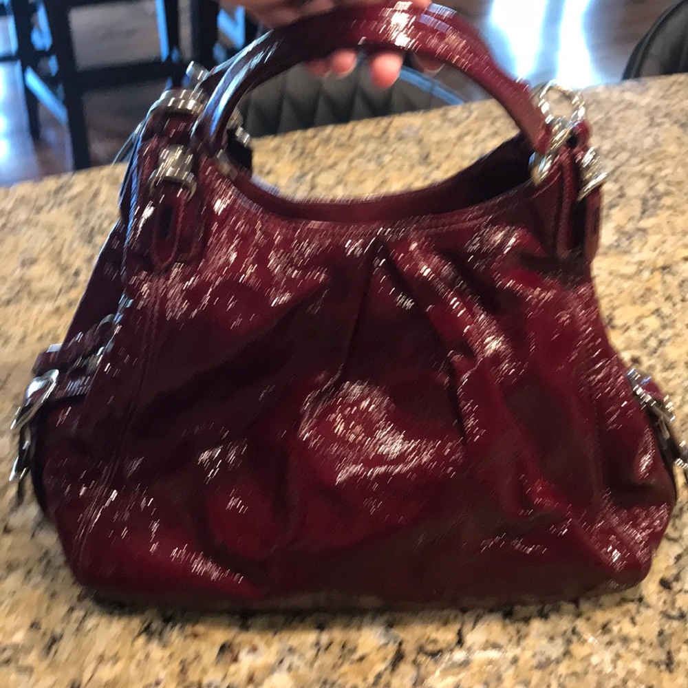 Coach patent leather bag.